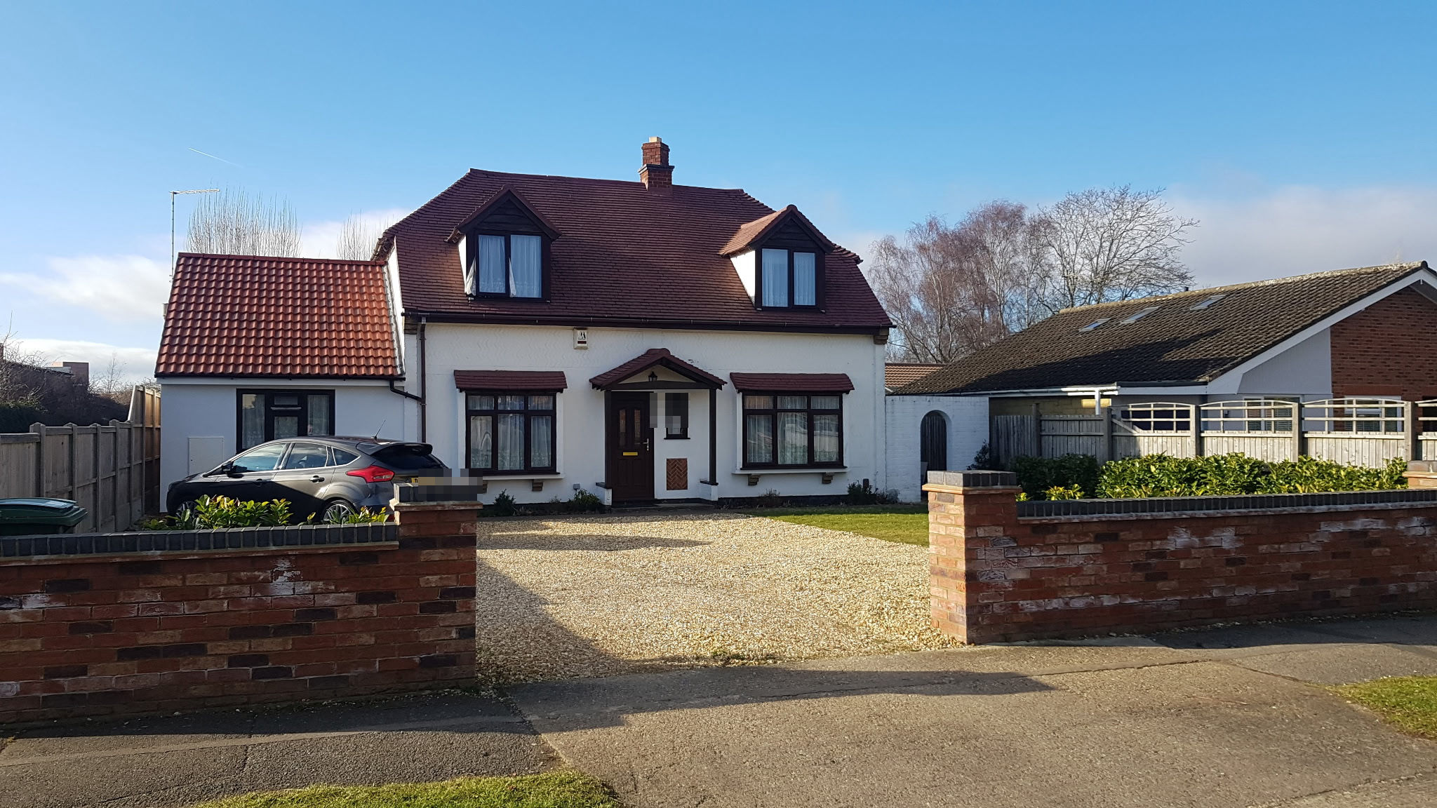 The original single-storey chalet from the front, before the works