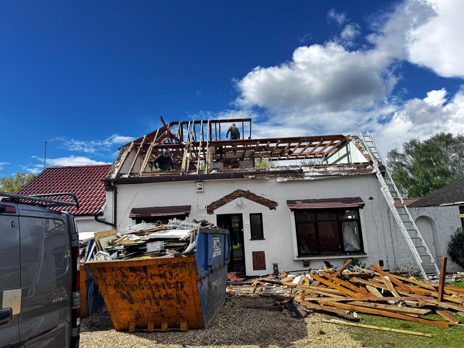 The original chalet roof being stripped out