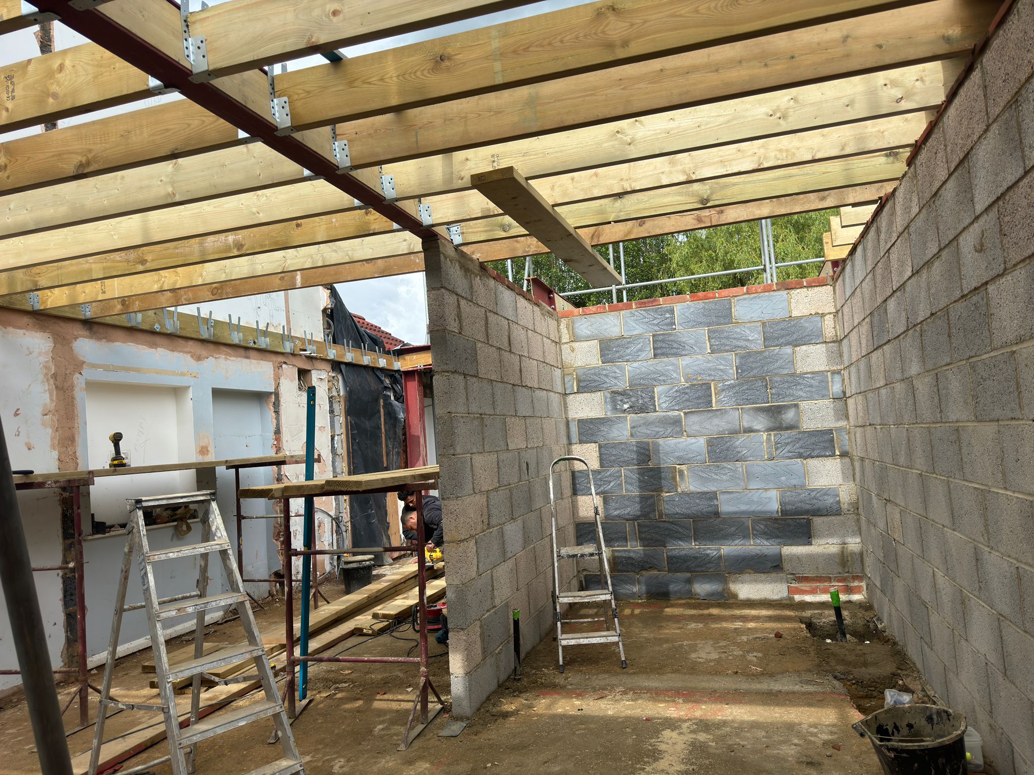 Interior structure with steel beams and timber joists
